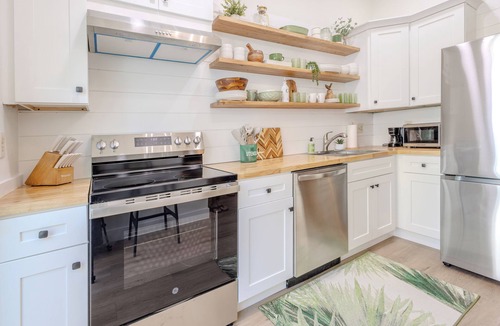 Whitney Beach Villa | Luxury two bedroom condo with heated pools, near AMI