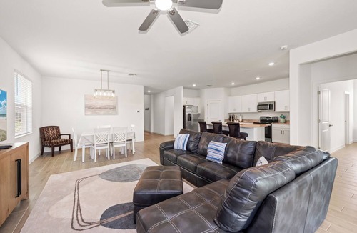 River Hall House | Luxury vacation living with water views, golf & resort-style pools.