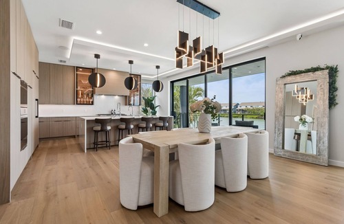 Indian Rocks Beach House | Luxury waterfront home: dock, pool, spa, golf sim