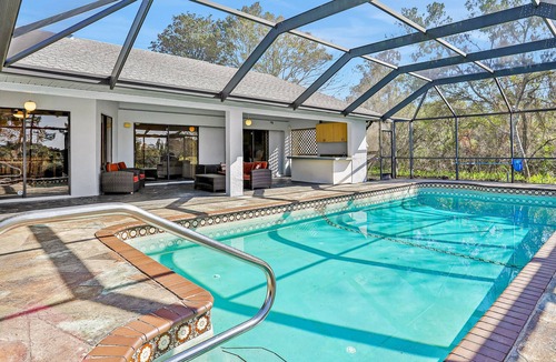Spring Hill House | Modern home with enclosed private pool on 7th tee of Oak Hills Golf Club