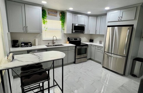 Citrus Park House | Modern tiny home with spacious backyard and pool