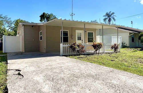Citrus Park House | Modern tiny home with spacious backyard and pool