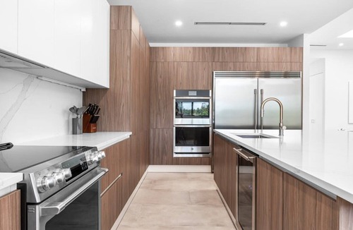 Ojus House | Modern Waterfront Paradise with Heated Pool - Near the Beach & Aventura Mall!
