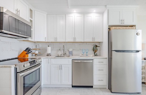 Panama City Beach Apartment | MY HAPPY PLACE TOO! BEACHFRONT! PATIO! FREE BEACH CHAIRS MARCH 1-OCTOBER 31