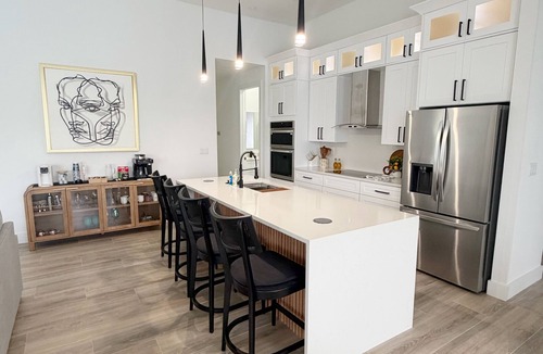 Trafalgar House | Newly Built Modern Vacation Home 4 BR/3 BA Your Own Heated Pool, Lanai on Canal