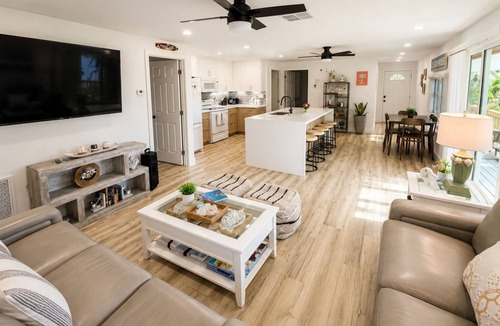 Port Pine Heights House | NEWLY RENOVATED 3/2 WITH POOL AND CANAL ACCESS! Pet-Friendly