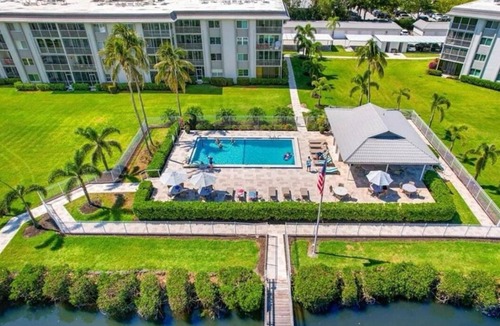 Redevelopment Area Condo | Nice 2-bedroom condo with AC in fabulous Naples with dock and pool ground floor!