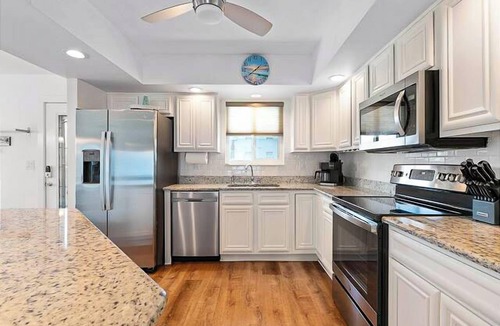 Marineland Acres House | Ocean Blue- Steps to Beach, Heated Pool, Golf Cart