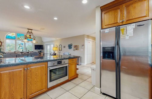 Cutthroat Harbor Estates House | Ocean-view snowbird retreat with private pool, rooftop, lanais, kayak & bikes