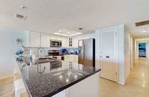 North Redington Beach Condo | Oceanfront condo with heated pool hot tub and grills