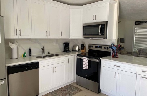 Layton House | Oceanfront Duplex with Beautiful Beach & Dock for Boat Access - Dogs OK