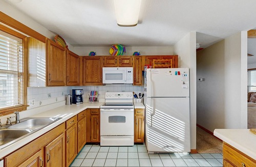Waves House | Oceanfront home with private hot tub, outdoor pool, fireplace, & game room