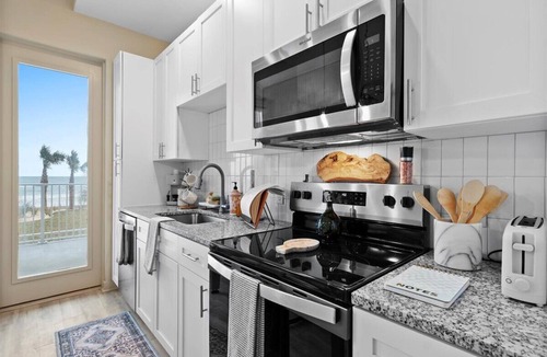 Seabreeze Park Condo | Oceanfront Oasis Daytona Beach 1BR/1BA - Parking Lot View - 249