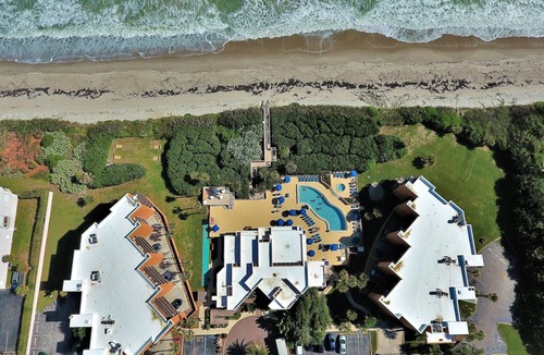 Indian Harbour Beach Resort | Oceanique 1: Coastal Getaway: 2BR Beachfront Resort Condo