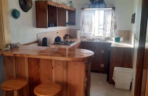 Capulin Cabin | Off Grid Cabin - "The Marshal's Office" at the High Plains Drift Inn