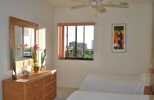 Pelican Bay Condo | OUTSTANDING LOCATION. End Unit Top Floor Condo near Beach, favored Pelican Bay