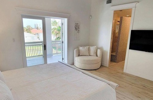 South Padre Island House | Padre Modern South Padre Island Group Rental with Pool and Fire Pit Near Beach TexasBeach House