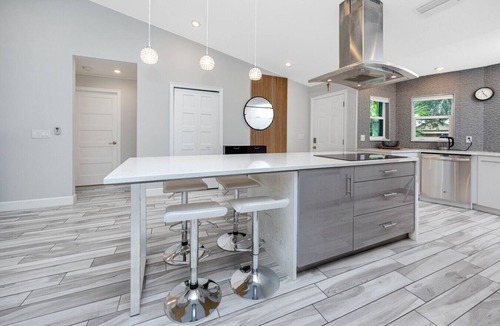 Palm Harbor House | Palm Harbor Hideaway | Gorgeous Home w/Heated Pool, Hot Tub & Tropical Oasis