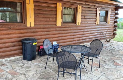 Mico Cabin | Peaceful and Pet Friendly Log Cabin near Medina Lake, Perfect for a Texas Hill Country Getaway