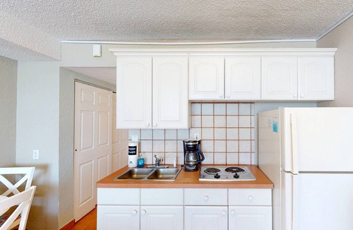 Treasure Island Condo | Peaceful Beachfront Vacation, Pool, Hot Tub, Tiki Bar & Tickets Included for Top Area Attractions!