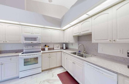 Crown Pointe House | Peaceful home with pool, patio, lanai, TV & fitness room - snowbird-friendly