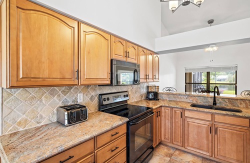Naples House | Peaceful Lakeview 3BR. Heated Pool Retreat.