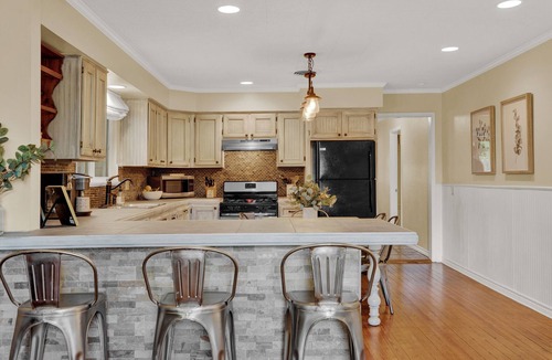Fredericksburg House | Peach Orchard Haus: 4 Blocks From Main St. | Outside Fire Pit | Deck | King Beds