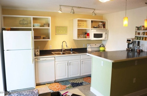 Cocoa Beach Villa | Penguins on the Beach | 2BR Steps to Beach & Downtown w/pool | Unit 2
