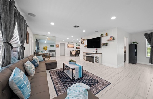 Riviera Beach House | Perfect for tournament teams, work crews, and family getaways, Sweet Pink offers a comfortable, peaceful stay designed to feel like your home away from home.