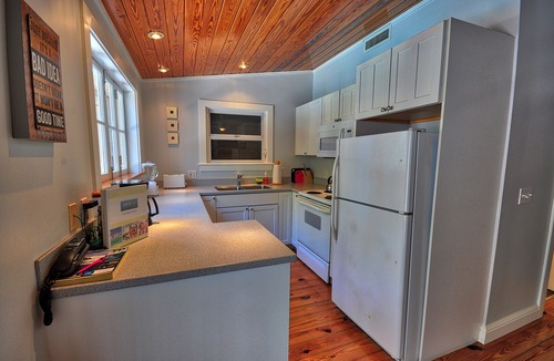 Uptown - Upper Duval Cottage | Pete's Cottages: Twin Cypress cottages steps from Duval