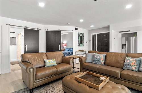 Caloosahatchee House | Pink Pineapple ~ Walk to Downtown ~ Chic Heated Pool Home
