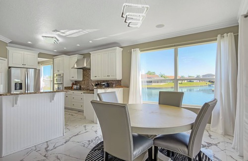 Palm Harbor House | Pool and canal front home in Palm Coast!