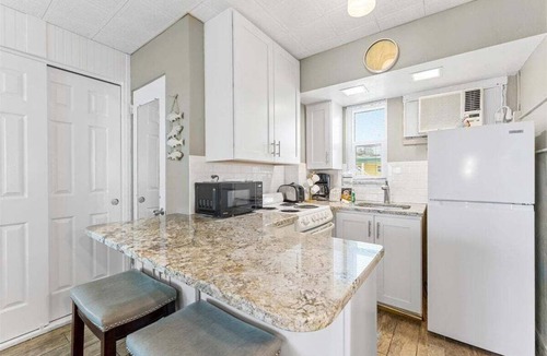 Treasure Island Condo | 🌴 Pool-facing Studio @ Tropic Terrace | Heated Pool Direct Beach Access ➠ TT55
