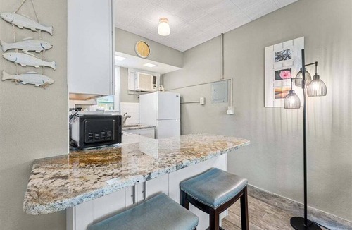 Treasure Island Condo | 🌴 Pool-facing Studio @ Tropic Terrace | Heated Pool Direct Beach Access ➠ TT55