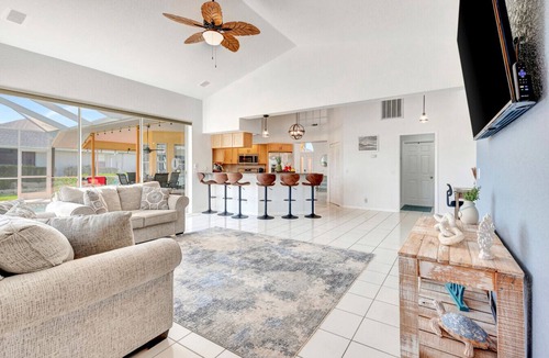 Broadmoor House | Pool + Game Room | Lanai & Canal View