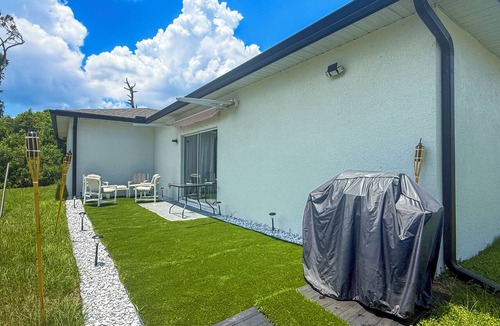 Gulf Cove House | Port Charlotte Getaway 4BR Sleeps 8 BBQ Near Englewood Beach