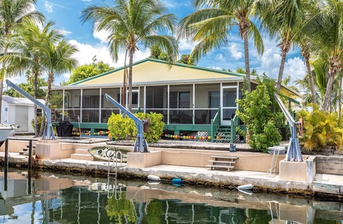 Pine Channel Estates House | Prime Time 2: Charming Canal Front Duplex, Your Gateway to South Pine Channel & Atlantic/Gulf Waters