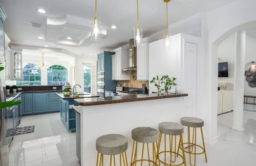 Palm City House | Private 5000 SF Waterfront Mansion w/Pool & Games