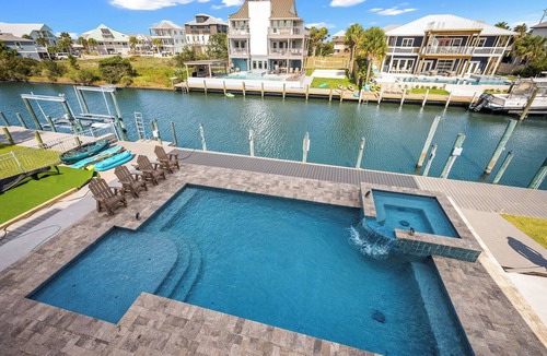 Perdido Key Coves One House | PRIVATE HEATED POOL & SPA, PRIVATE BEACH, VOLLEYBALL & PICKLEBALL. BOAT DOCK