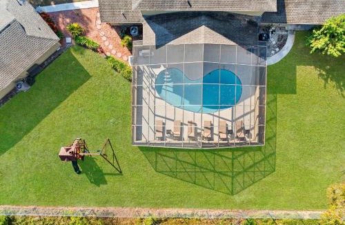 Westchase House | Private Pool Pickleball Game Room Sleeps 18