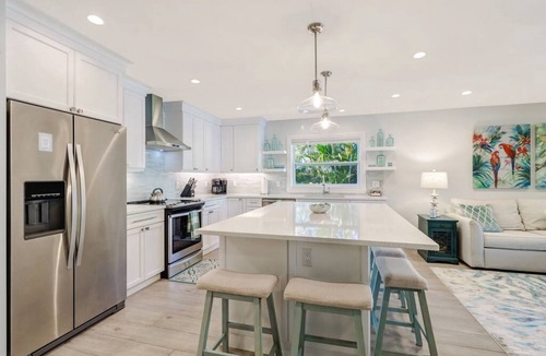 Naples Park House | Private Tropical Oasis - Summer/Fall Reduced 10% - Heated Pool/Spa - 1 Mile to Beach!