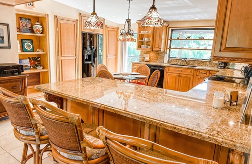 Pirates Cove House | Private waterfront resort, screened pool, hot tub, 90' dock, immaculate home.