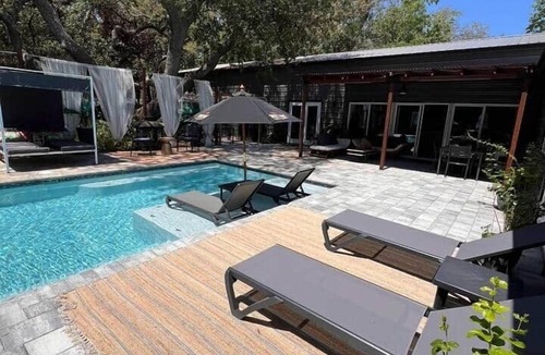 Lutz House | Purple Rain+New Orleans Garden Guest Suites