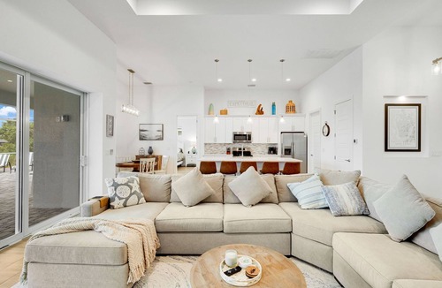 Mariner House | Relax & Unwind: Canal-Front Escape with Pool, Hot Tub & Lanai