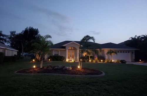 Broadmoor House | Relaxing in Rotonda Poolside. Saltwater heated Pool with new screened lanai.