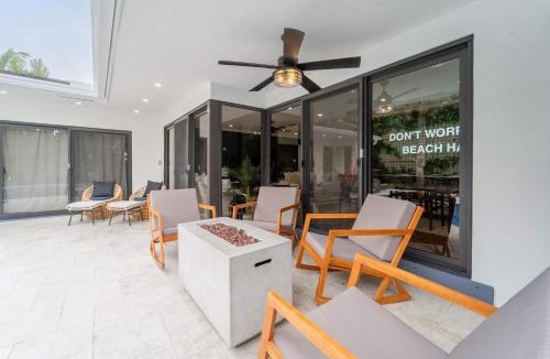Imperial Point House | Resort Style Backyard Heated Pool Hot Tub Fire Pit