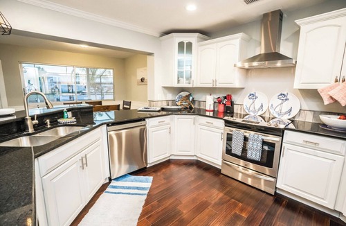 Apollo Beach House | Resort-Style Canal Home w/Pool & Putting Green - Baywatch