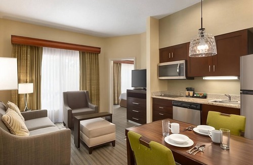 Feather Sound Hotel | Retreat to Understated Elegance! Free Breakfast, Full Kitchen, Outdoor Pool!