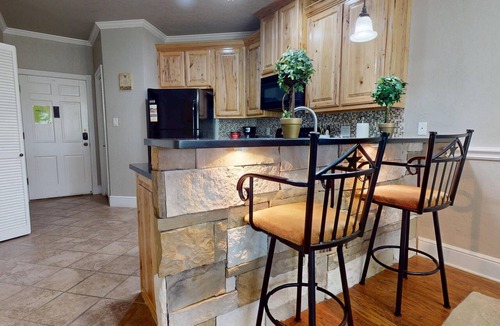 New Braunfels Condo | River City Resorts: INV 211: Free Tubes, On Comal, Walk to Schlitterbahn