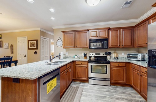 Helen Condo | Riverfront oasis with dual suites, 3 fireplaces, central AC, & walkable locale